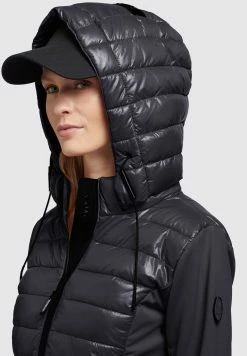 Khujo Ghita Shiny - Chaqueta De Entretiempo - Schwarz -Khujo Ventas 7c363378061043ca883ce76bdbb9cacd scaled